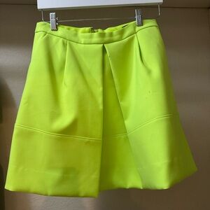 Electric green J Crew mini skirt with center, exposed zipper